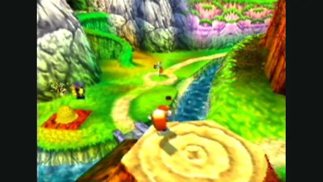 Conker overlooks colorful paths and a stream in the game’s overworld. Original-game reference.