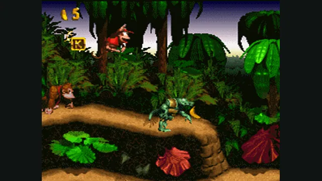 Diddy Kong faces a Kremling on a jungle path in Donkey Kong Country. Original-game reference.