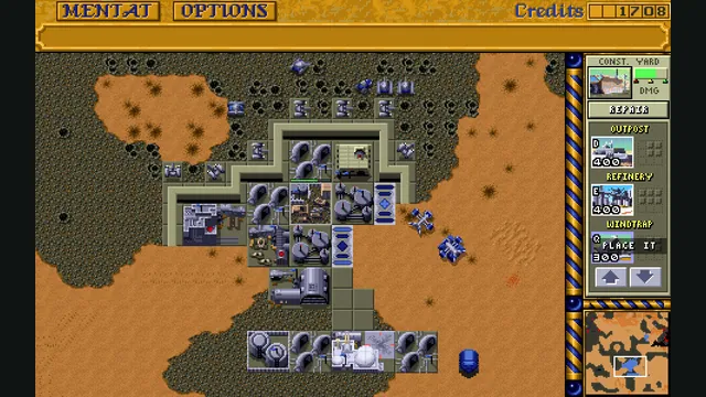 Blue Dune II units and buildings occupy a desert base with Dune Dynasty’s command sidebar visible.