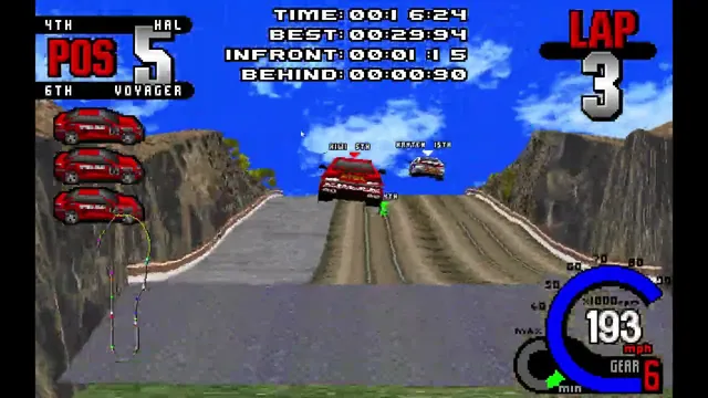 Cars jump over a steep track during a race in the creator’s Whiplash port demonstration.