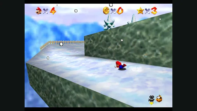 Mario slides down a snowy slope beside a stone wall in the original Super Mario 64.
