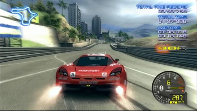 A red car fires nitro on a coastal highway in Ridge Racer 6.