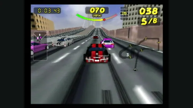 A black-and-red car races across a bridge in the original Rush 2: Extreme Racing USA.