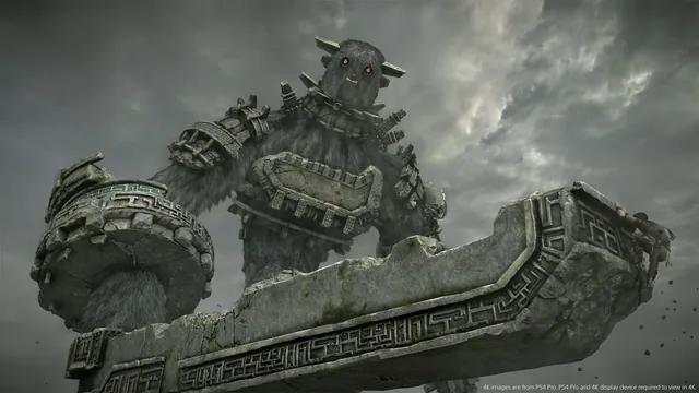 A towering stone-armored colossus beneath a cloudy sky in the 2018 Shadow of the Colossus remake.