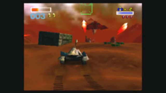 The Landmaster travels over a rocky landscape with health and hit counters in Star Fox 64. Original-game reference.